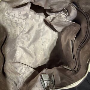 Metallic silver Michael Kors purse with wallet